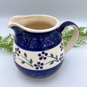 Bl� og hvid keramik kande