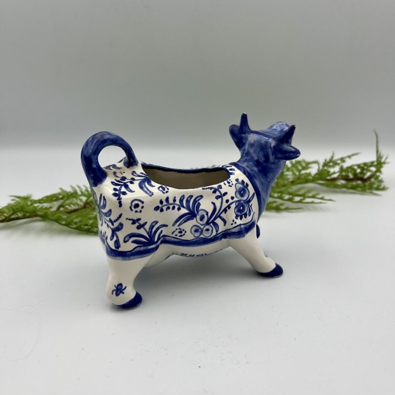 Fl�dekande udformet som en ko