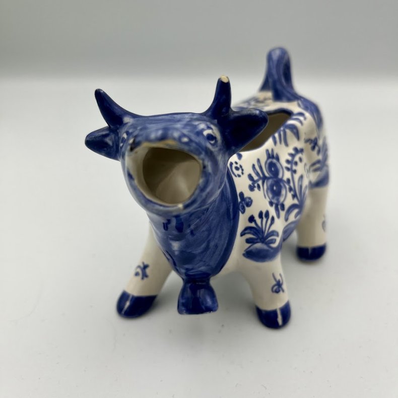 Fl�dekande udformet som en ko