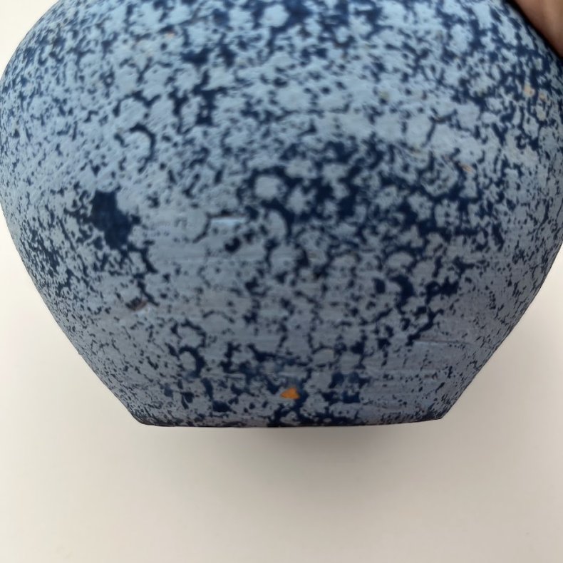 Bl� keramikskjuler