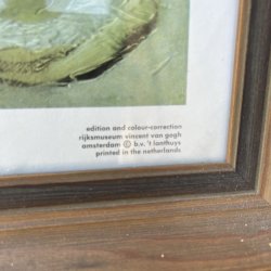 Kunsttryk af et par slidte st�vler