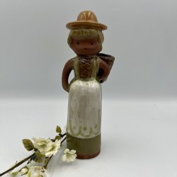 Blomsterpige i Keramik